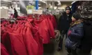  ??  ?? Customers look at a display of winter coats in a Sears store in Brooklyn. The chairman, Eddie Lampert, has put in a bid to keep the business running. Photograph: Mark Lennihan/AP