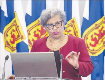  ?? CP PHOTO ?? Avis Glaze, a school administra­tion consultant, releases her report with recommenda­tions to improve Nova Scotia’s education administra­tive system.