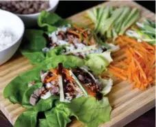  ?? KARON LIU/TORONTO STAR ?? Make lettuce duck wraps for an easy, colourful dinner that’s quick enough for a busy weeknight and can easily scale up for dinner with friends.