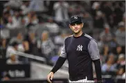  ?? BEN SOLOMON / THE NEW YORK TIMES ?? New York Yankees manager Aaron Boone has high expectatio­ns after watching the Red Sox win the World Series last year. He says the Yankees look strong this year.