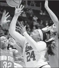  ?? AP/JAMES CRISP ?? Notre Dame’s Arike Ogunbowale (24) scored a career-high 32 points to lead the Fighting Irish to a 99-76 victory over Ohio State on Friday in Lexington, Ky.