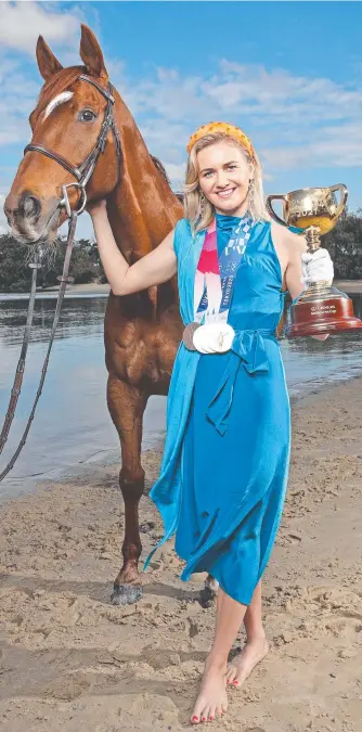  ?? Picture: Zak Simmonds ?? Tokyo Olympic Games gold medallist Ariarne Titmus, on the Gold Coast with retired racehorse Immortalis, has been announced as the 2021 Melbourne Cup Day Ambassador.