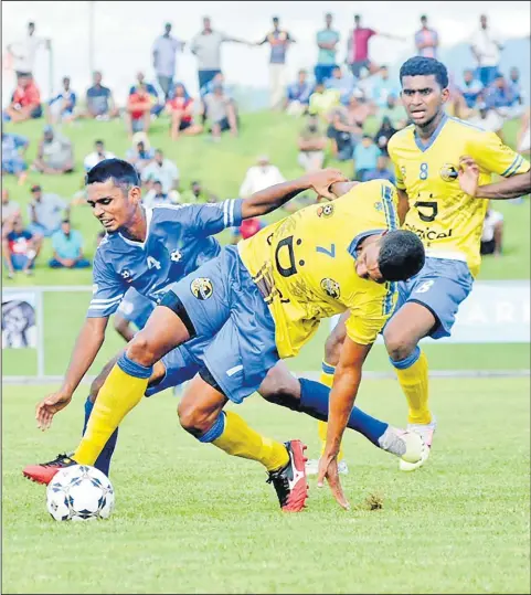  ?? Picture: REINAL CHAND ?? Nadroga’s Paulo Buke and Lautoka’s Afraz Ali battle for possession during their match in the Digicel Premier League at Churchill Park in Lautoka.