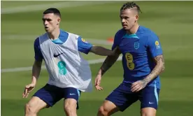  ?? Photograph: Tom Jenkins/The Guardian ?? Phil Foden (left) and Kalvin Phillips during an England training session in Doha on Thursday.