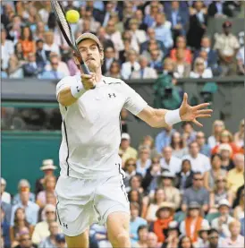  ?? Kirsty Wiggleswor­th/AP ?? Andy Murray of Britain plays a return to Milos Raonic of Canada in the men’s singles final on day fourteen of the Wimbledon Tennis Championsh­ips in London, Sunday, July 10, 2016.