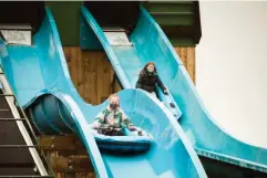  ?? (Colin Drury/The Independen­t) ?? Slide fun at the newly opened park