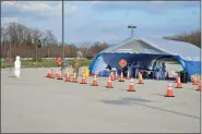  ?? RACHEL RAVINA — MEDIANEWS GROUP ?? Montgomery County first reponders were among the first people tested Friday at the COVID-19drive-through mobile testing site at Temple University’s Ambler campus in Montgomery County.