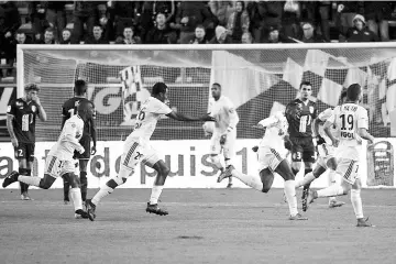  ??  ?? Amiens’ French forward Harrison Manzala (C) celebrates with teammates after scoring a goal during the French L1 football match between Amiens and Lille (LOSC) on November 20, 2017 at the Licorne stadium, in Amiens. - AFP photo