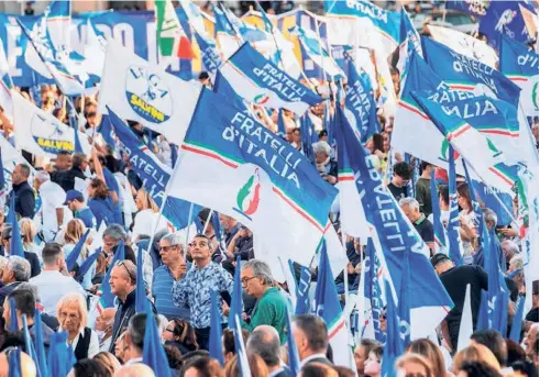  ?? ?? SUPPORTERS OF BROTHERS OF ITALY party at rally in Rome on September 22.