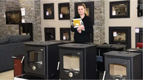  ??  ?? Stove and Heating specialist Wioletta Wojciechow­ska at Corcoran’s Stove and Fireplace Centre, Cork Road, Killarney.