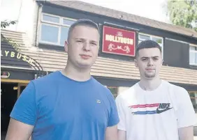  ??  ?? > Jack Norman, left, and Rhys Grech who helped throw Darren Osborne out of the Hollybush pub in Pentwyn after an alleged anti-Muslim tirade