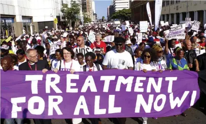 ?? Photograph: AP ?? A march at the 2016 world Aids conference in Durban. Treatment Action Campaign’s work in South Africa led to the foundation of the Global Fund which helped provide equal access to antiretrov­iral therapy and saved 38 million lives.