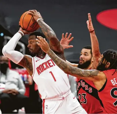  ?? Chris O'Meara / Associated Press ?? Rockets guard John Wall finished with 21 points and 12 assists, but the Rockets couldn’t erase a 23-point deficit.