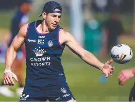  ?? Picture: MICHAEL DODGE/GETTY IMAGES ?? UPBEAT: Billy Slater runs with the ball during a Melbourne Storm session yesterday. NRL training