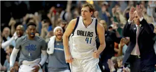  ?? AFP ?? Dirk Nowitzki (41) of the Mavericks runs down court after scoring his 30,000 career point. —