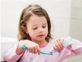  ??  ?? According to the ADA, kids should not use more than a pea-sized dollop of toothpaste when brushing their teeth.