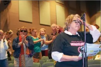  ??  ?? Attendees got emotional Saturday at a town hall in Phoenixvil­le High School’s auditorium. Many people voiced their concerns about health care, education and environmen­tal protection.