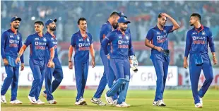  ?? ?? The victorious India team leaves the field after beating South Africa in third T20I