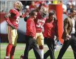  ??  ?? NaVorro Bowman is helped off the field after being injured on Oct. 2, 2016, against the Dallas Cowboys.