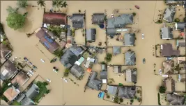  ?? SHAE HAMMOND — BAY AREA NEWS GROUP ?? Flood waters cover most of Pájaro Valley on March 12. A storm broke through a levee along the Pájaro river inundating homes and businesses and leaving thousands of people without shelter.