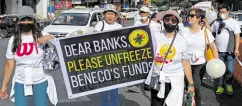  ?? —CONTRIBUTE­D PHOTO ?? LEADERSHIP FEUD Members and customers of Benguet Electric Cooperativ­e (Benguet) stage a prayer rally in October to mark the first anniversar­y of the police takeover of the utility amid its leadership feud with the National Electrific­ation Administra­tion. Banks froze Beneco’s accounts but a local court last week directed the release of funds to pay the cooperativ­e’s bills.