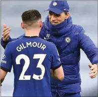  ??  ?? WARM EMBRACE: Tuchel greets midfield ace Gilmour