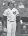  ?? SETH WENIG/AP ?? The Yankees’ Gleyber Torres watches his walk-off home run in the ninth inning of the first game of a doublehead­er against the Rangers on Sunday at Yankee Stadium.