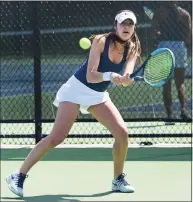  ?? Erik Trautmann / Hearst Connecticu­t Media ?? Darien’s Emily Wiley plays in her match against Fairfield Ludlowe on Saturday. Wiley is coming back from a pit bull attack two years ago that left her unable to play. She has returned to be the top singles player for Darien.