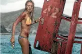  ??  ?? It’s Blake Lively versus a shark in The Shallows.