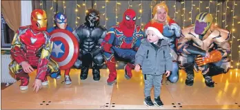  ?? 50_c49lights0­3 ?? Little Jaxon Paterson met the superheroe­s who helped switch on the lights.