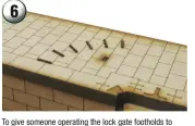  ??  ?? 6
To give someone operating the lock gate footholds to push against, a series of push-stops are fitted in an arc around the pivot. On the model, these slot into partetched marks on the top surface.