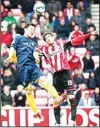  ??  ?? Sunderland’s Danny Graham (right), vies for the ball with Southampto­n’s Maya Yoshida (left), during their English Premier League soccer match between Sunderland and Southampto­n at the Stadium of Light, Sunderland,
England, on May 2. (AP)