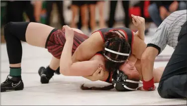  ?? PHOTOS BY JIM GENSHEIMER ?? Fremont’s Annabel Garcia puts the pressure on Gunn’s Mikayla Silverman on the way to winning the 150 division at the Central Coast Section Girls Wrestling Championsh­ips on Feb. 22at Independen­ce High.