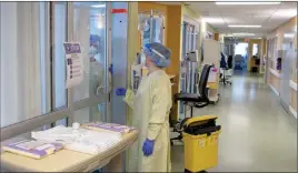  ?? The Canadian Press ?? Nurses tend to a COVID-19 patient at the Bluewater Health Hospital in Sarnia, Ont.