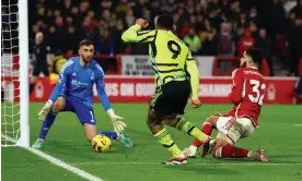  ?? ?? Gabriel Jesus puts Arsenal ahead at the City Ground by beating Nottingham Forest’s Matt Turner with a close-range shot from a tight angle. Photograph: Lee Smith/Action Images/ Reuters