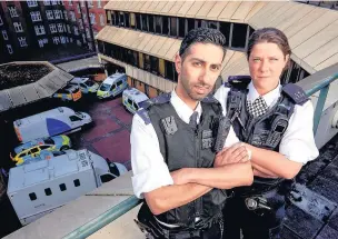  ??  ?? PC Mohammad ‘Oz’ Bhatti and PC Laura Walker on duty