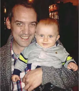  ??  ?? Fighting the pain: Kieron Tapsell and his 19-month-old son, Jake