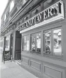  ?? [KAREN SCHIELY/AKRON BEACON JOURNAL] ?? Highland Tavern in Akron is the first Ohio bar to lose its liquor license for violating the state’s COVID-19 orders.