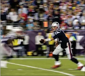  ??  ?? Le quarterbac­k des Patriots Tom Brady est l’une des stars de la discipline.