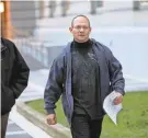  ?? KEVIN R. WEXLER/NORTHJERSE­Y.COM ?? Paterson Police Sgt. Michael Cheff, right, is seen leaving federal court in Newark in 2020. His attorney says no decision has been made on whether to ask the U.S. Supreme Court to intervene after the appeal was denied.