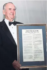  ??  ?? Businessma­n Antony ‘Tony’ Hart holds the citation presented to him at his induction in the PSOJ Hall of Fame in 2013. Hart is giving up business-related pursuits to focus on philantrop­hy.