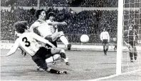  ?? PA ?? Crowning glory: David Johnson nets one of his two goals in the 1980 victory over Argentina