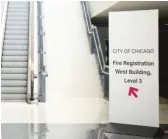  ?? PAT NABONG/SUN-TIMES ?? A sign directs firefighte­rs entering McCormick Place to the promotion tests being administer­ed there starting Wednesday.