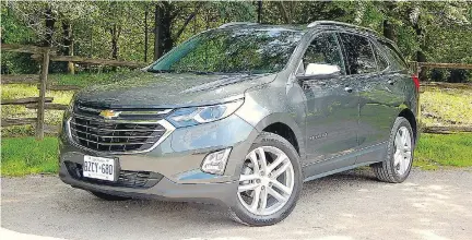  ?? BRIAN HARPER/DRIVING ?? The 2018 Chevrolet Equinox might not boast a drop-dead gorgeous exterior but it does offer a smooth and lively ride, provides decent towing power, handles well and goes easy on fuel.