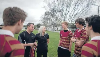  ?? Photo: IAIN MCGREGOR/FAIRFAX NZ ?? Aaron (AJ) Flynn and EmmaWard have just marked their first year of supplying work gear and sportswear, which they do between day jobs.