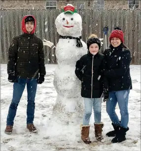  ?? Photograph courtesy of Shaye Brouse ?? Snowmen were easily created with the heavy wet snow Sunday.