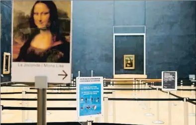  ??  ?? La Gioconda de Leonardo espera els visitants entre grans mesures de seguretat