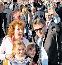  ??  ?? A day to remember: Aintree was at its glorious best in the sunshine yesterday, glittering, grand and gorgeous
