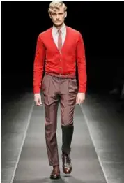  ??  ?? red pullover sweater for that classic preppy look.
