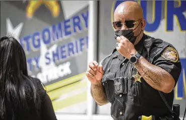  ??  ?? The Montgomery County Sheriff’s Office will equip deputies with body-worn cameras similar to the model being sported by Deputy Herman Dixon.
